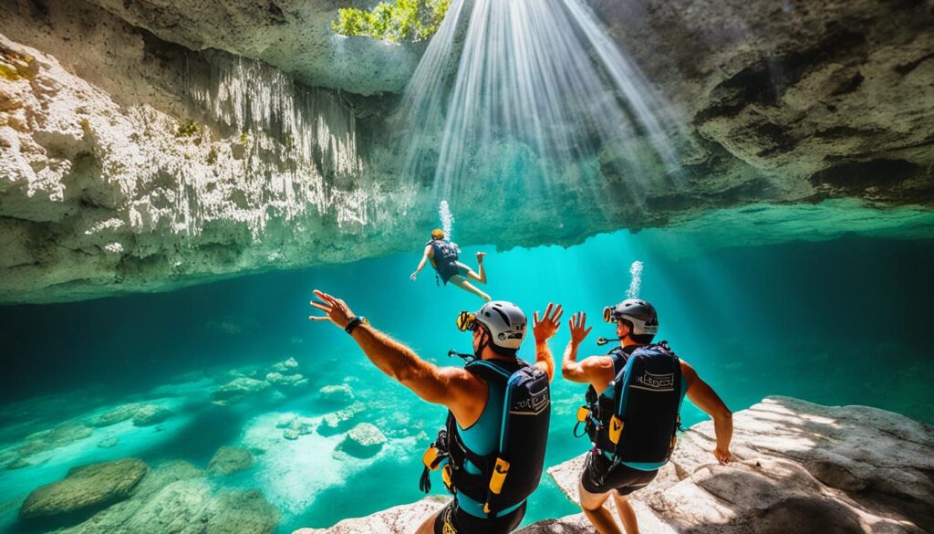 couples diving into Cancun cenote
